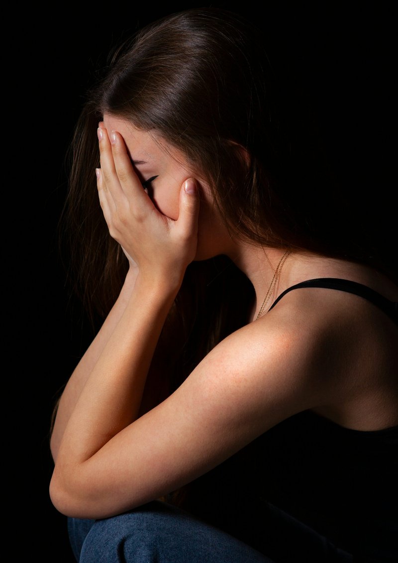A woman sitting down with her hands on her face photo – Free Portrait Image on Unsplash A woman sitting down with her hands on her face photo – Free Portrait Image on Unsplash
