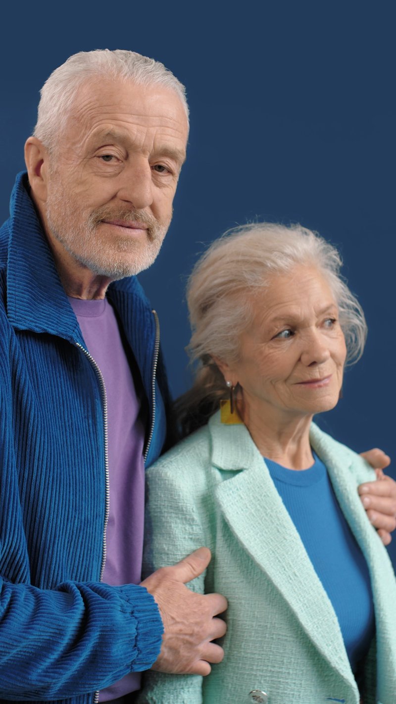 Elderly Couple Looking at Camera
