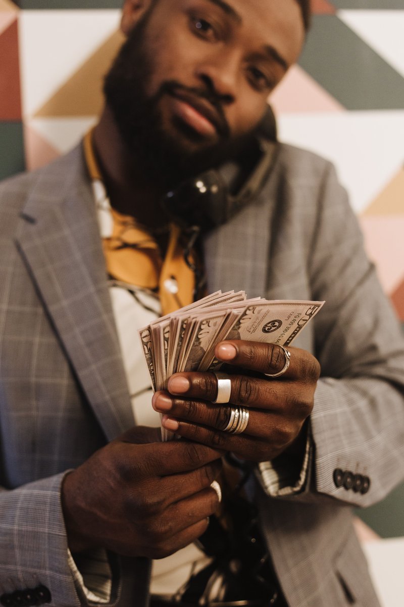 Man Holding Money Photos, Download The BEST Free Man Holding Money Stock Photos & HD Images