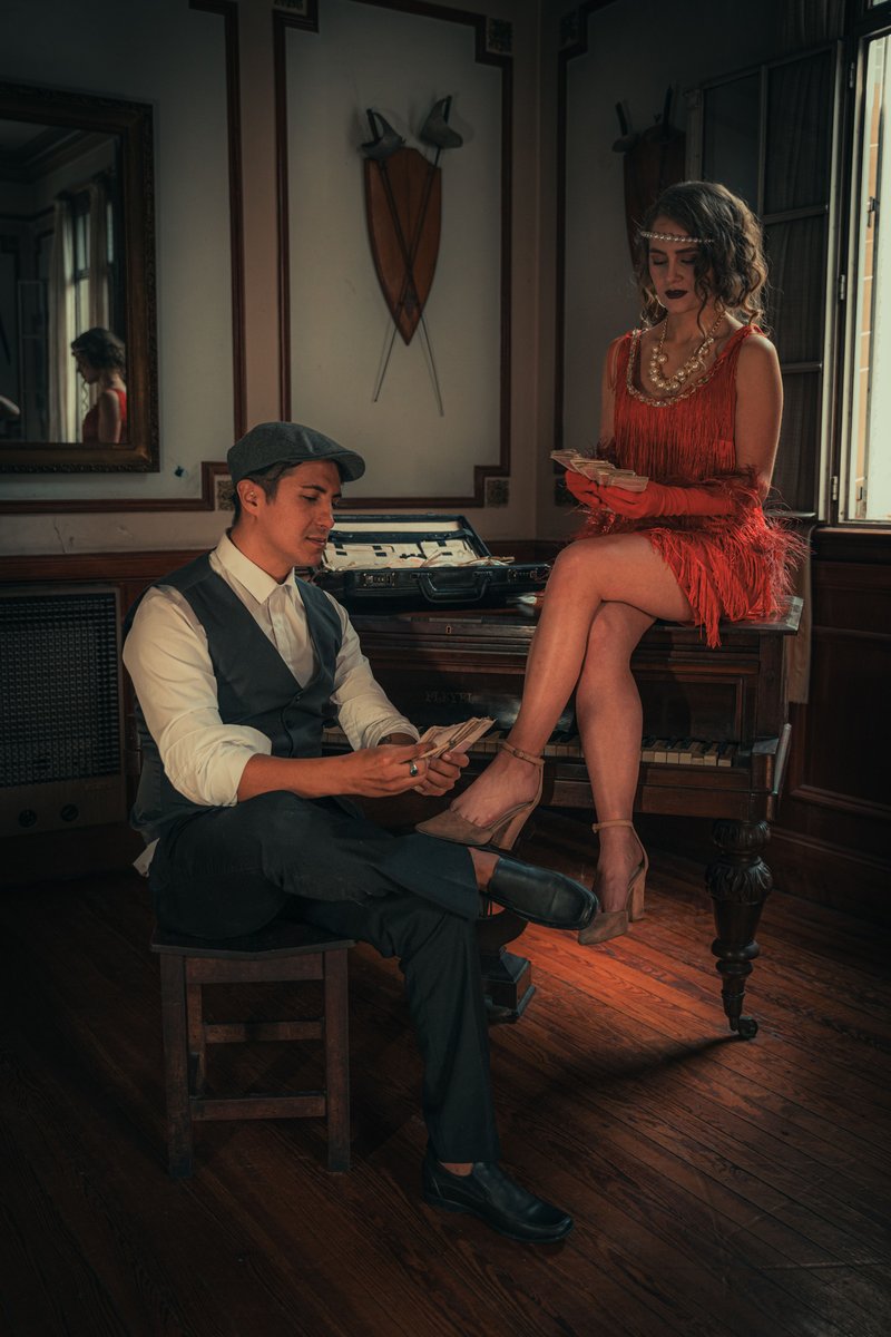 Man and Woman in Red Dress Counting Money in Mansion · Free Stock Photo