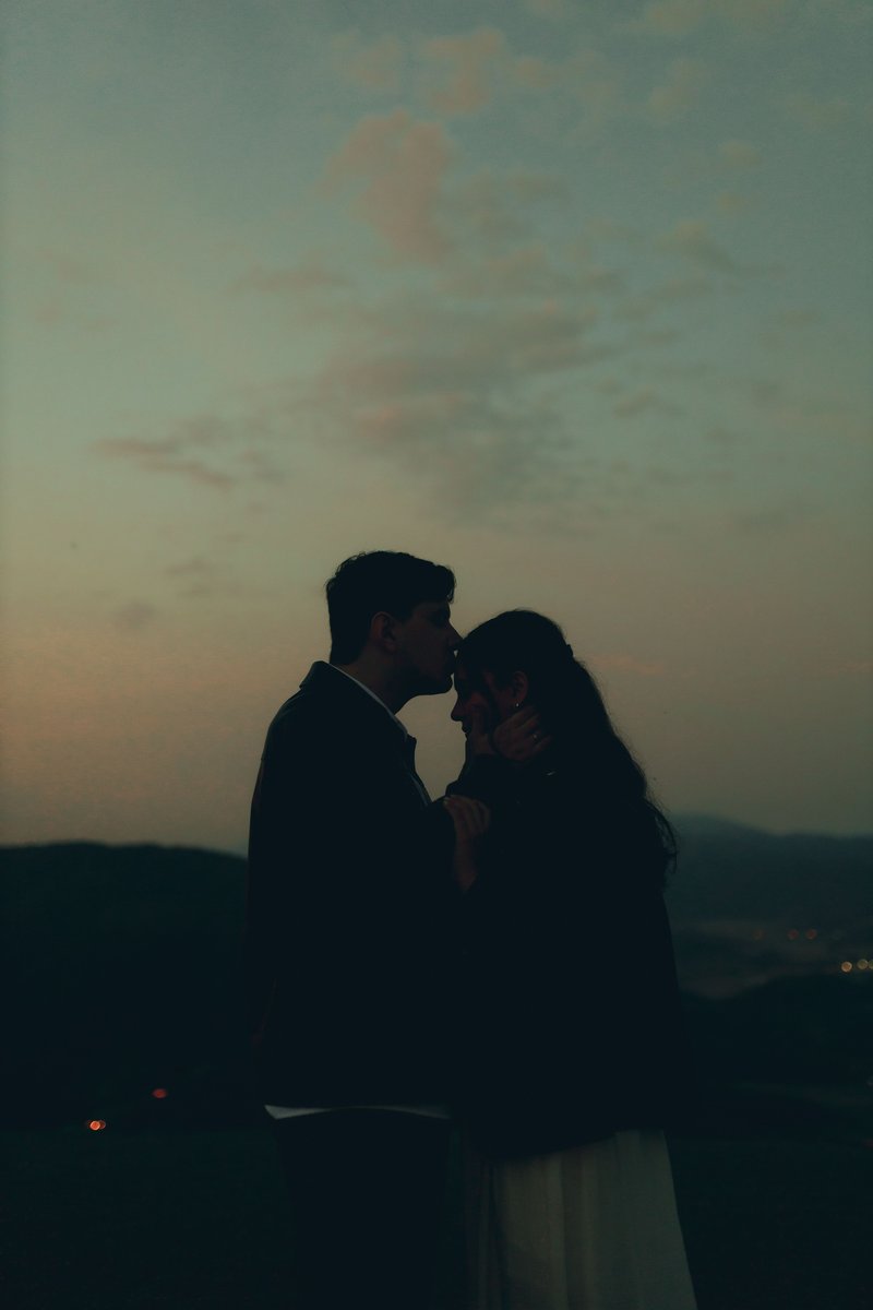 Romantic Couple Embracing at Twilight · Free Stock Photo Romantic Couple Embracing at Twilight · Free Stock Photo