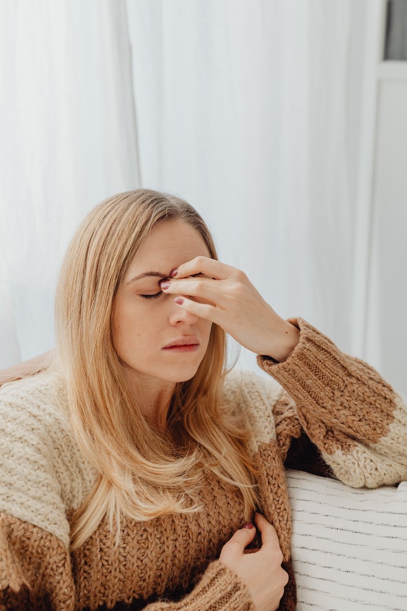 Woman Holding Her Nose Because of Sinus Pain · Free Stock Photo Woman Holding Her Nose Because of Sinus Pain · Free Stock Photo