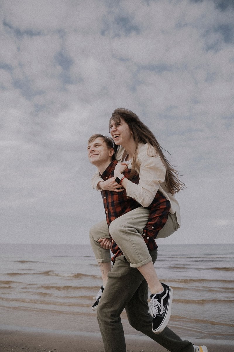 A Couple Hugging on a Beach &middot; Free Stock Photo