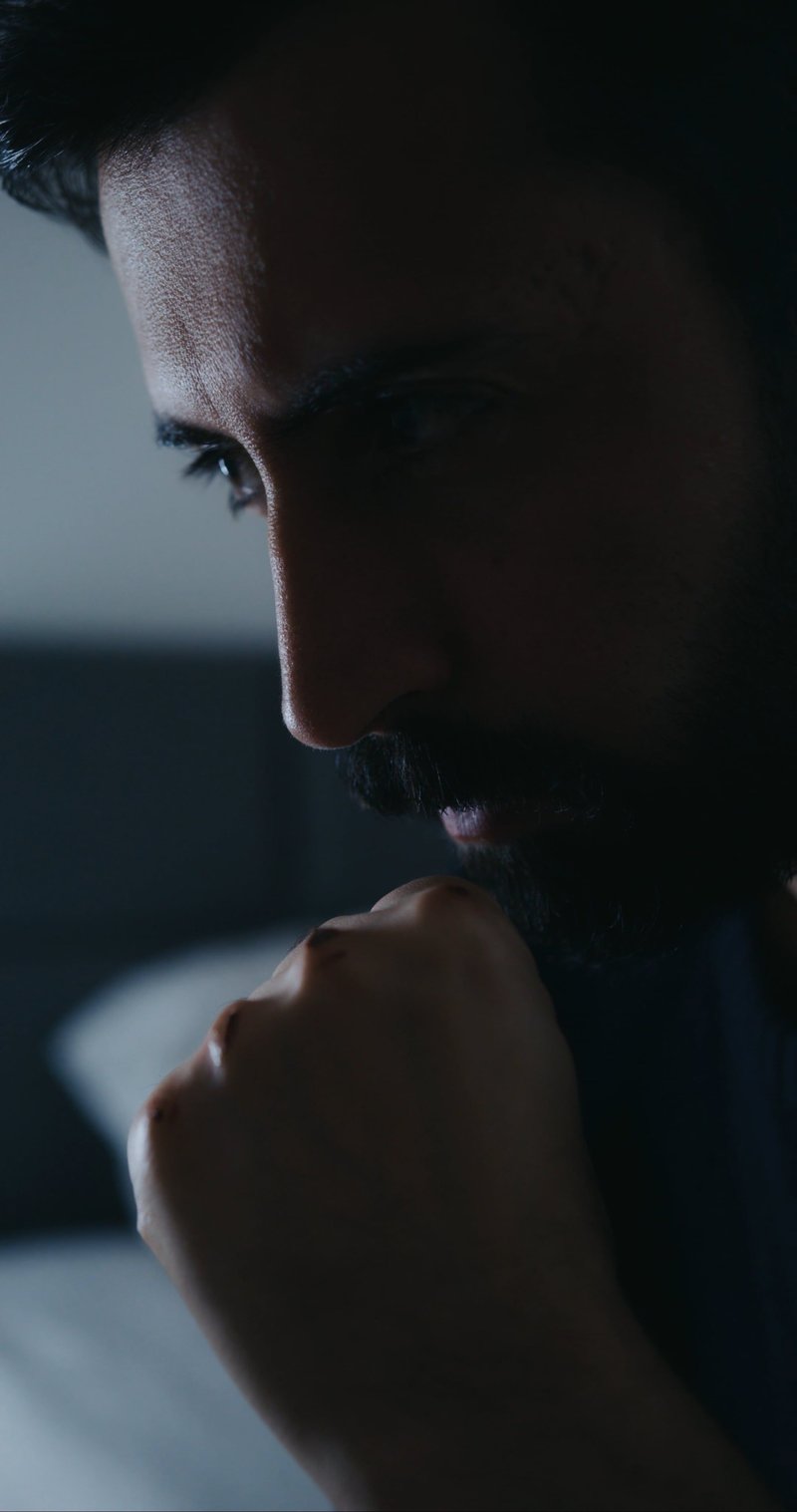 A Man with Bruises on His Fist A Man with Bruises on His Fist