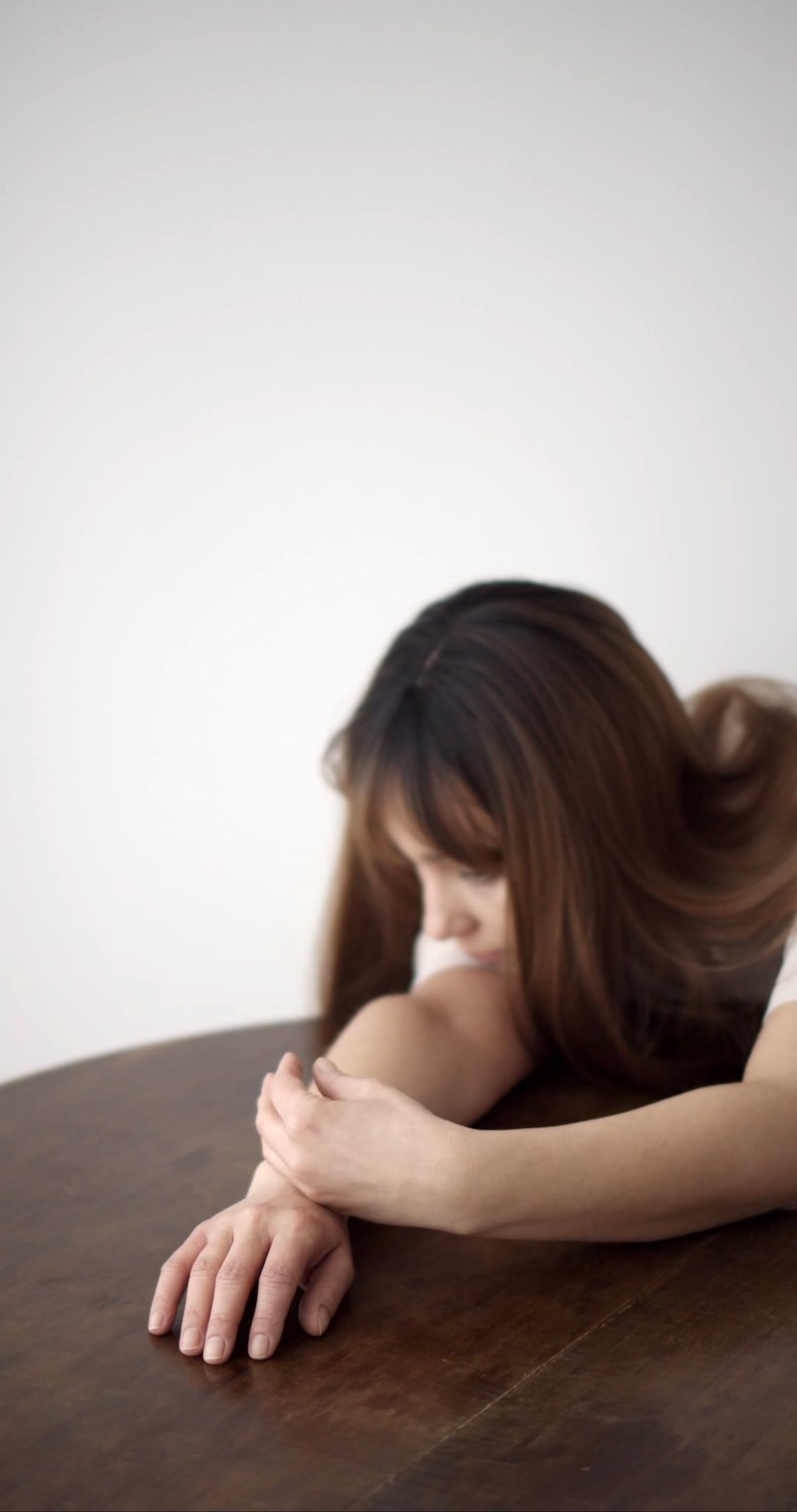 A Woman Who Looks Depressed Leaning on the Table Free Stock Video Footage, Royalty-Free 4K & HD Video Clip