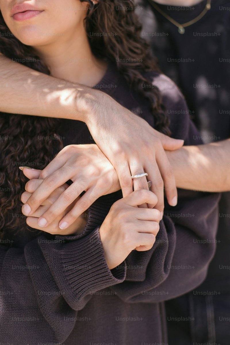 A couple embraces and holds each other. photo &ndash; Couple Image on Unsplash