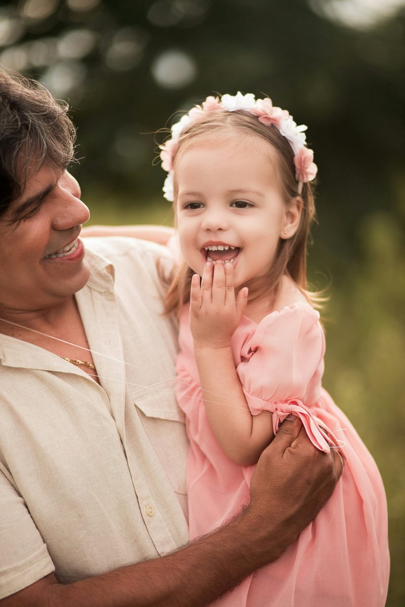 A man holding a little girl in his arms - Free Photo on Unsplash A man holding a little girl in his arms - Free Photo on Unsplash