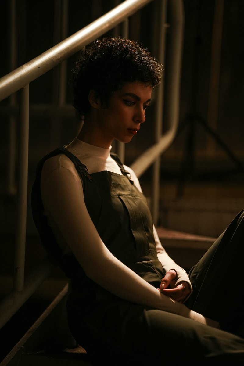 A woman sits alone on some stairs. photo – Free Green Image on Unsplash A woman sits alone on some stairs. photo – Free Green Image on Unsplash