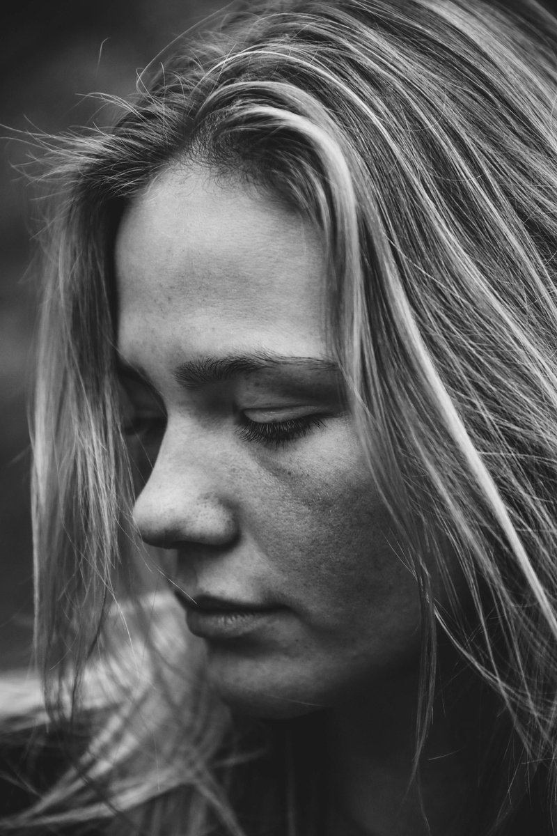 A woman with long hair photo – Free Sad Image on Unsplash
