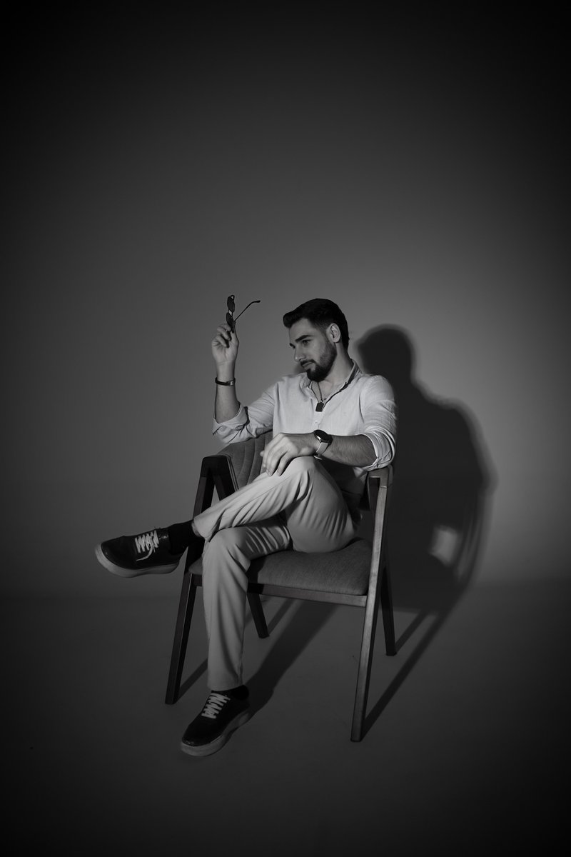 Black and White Portrait of Stylish Man Seated · Free Stock Photo Black and White Portrait of Stylish Man Seated · Free Stock Photo