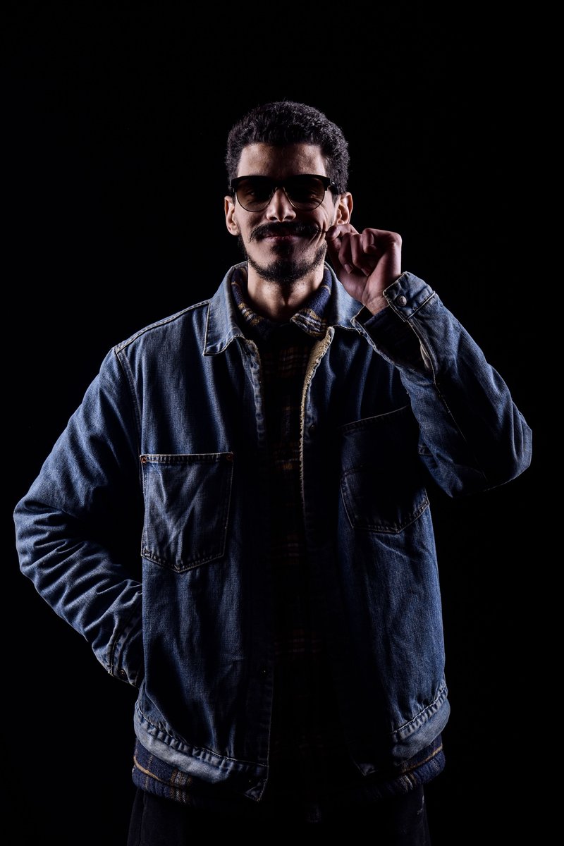 Cool Stylish Man in Denim Jacket on Dark Background &middot; Free Stock Photo