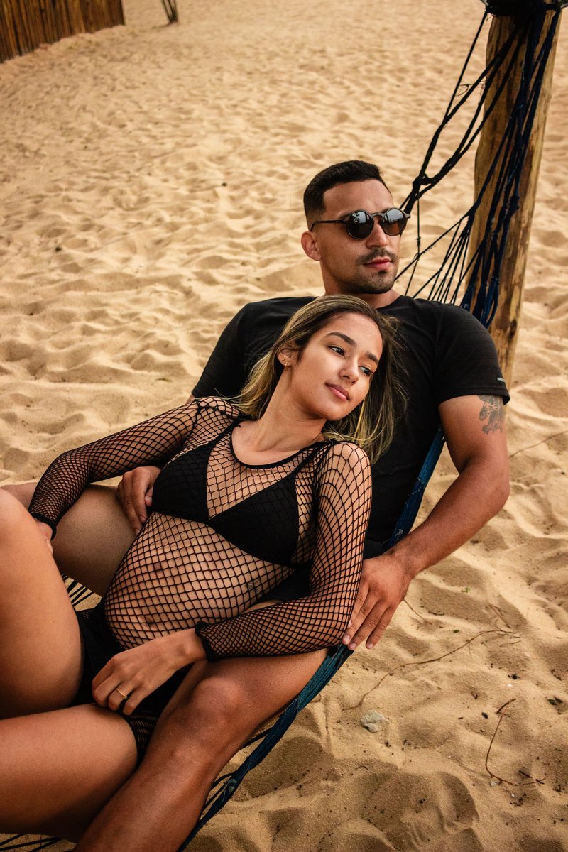 Couple Lying in a Hammock on the Beach · Free Stock Photo Couple Lying in a Hammock on the Beach · Free Stock Photo