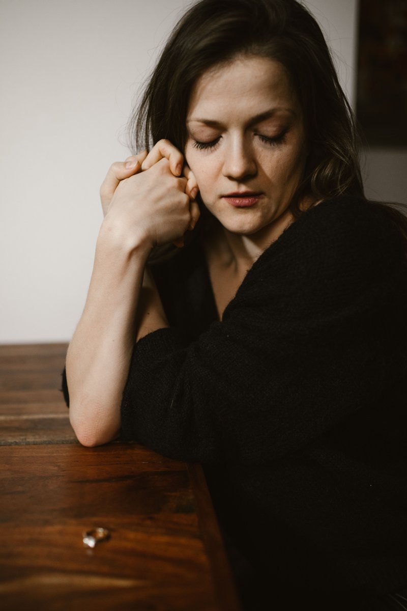 Crying Woman Leaning on Brown Wooden Table · Free Stock Photo Crying Woman Leaning on Brown Wooden Table · Free Stock Photo