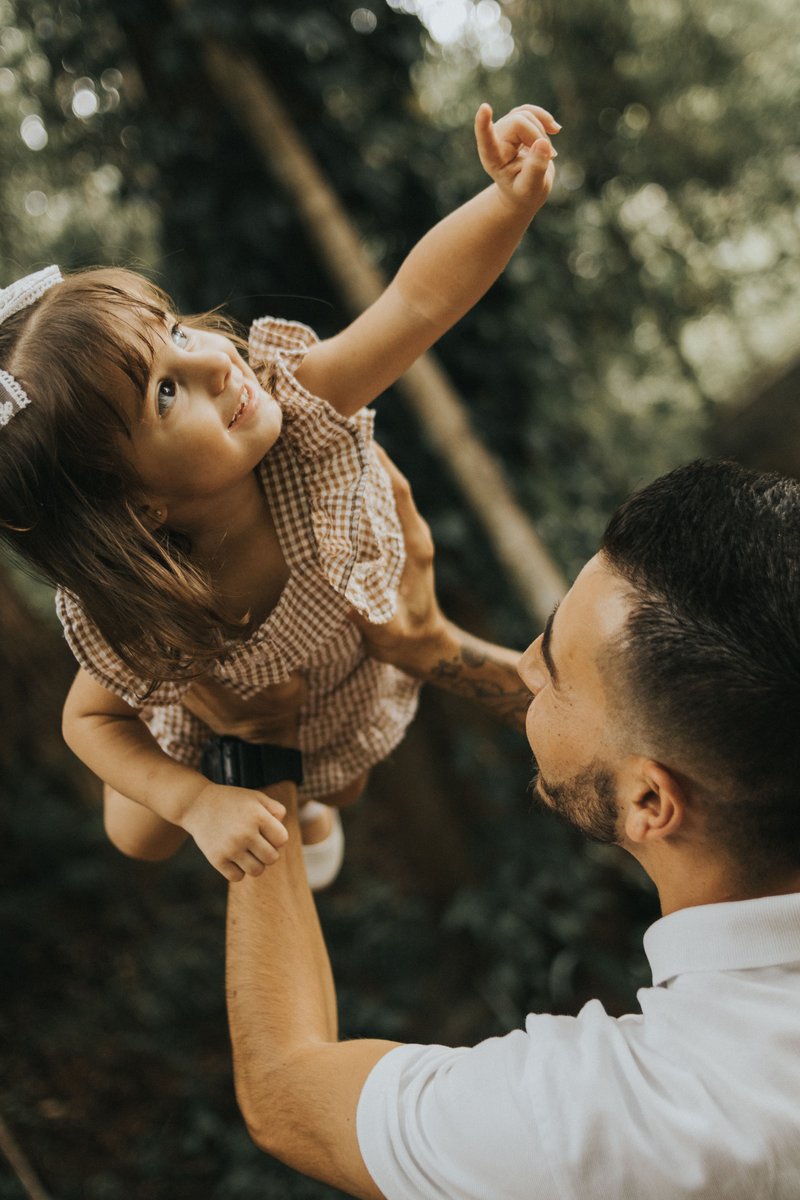 Father Lifting Daughter Outdoors in Playful Moment · Free ... Father Lifting Daughter Outdoors in Playful Moment · Free ...