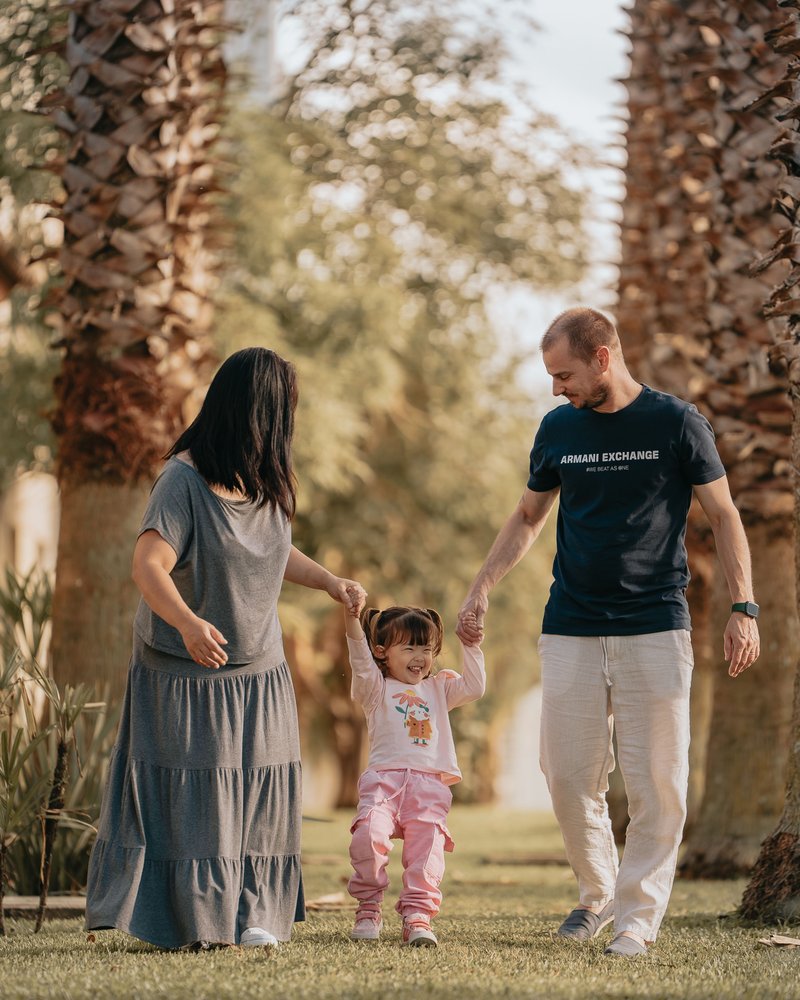 Happy Family Enjoying a Day in the Park &middot; Free Stock Photo