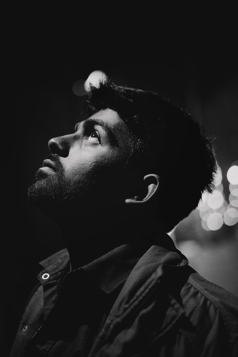 Monochrome Photo of Man Looking Up · Free Stock Photo