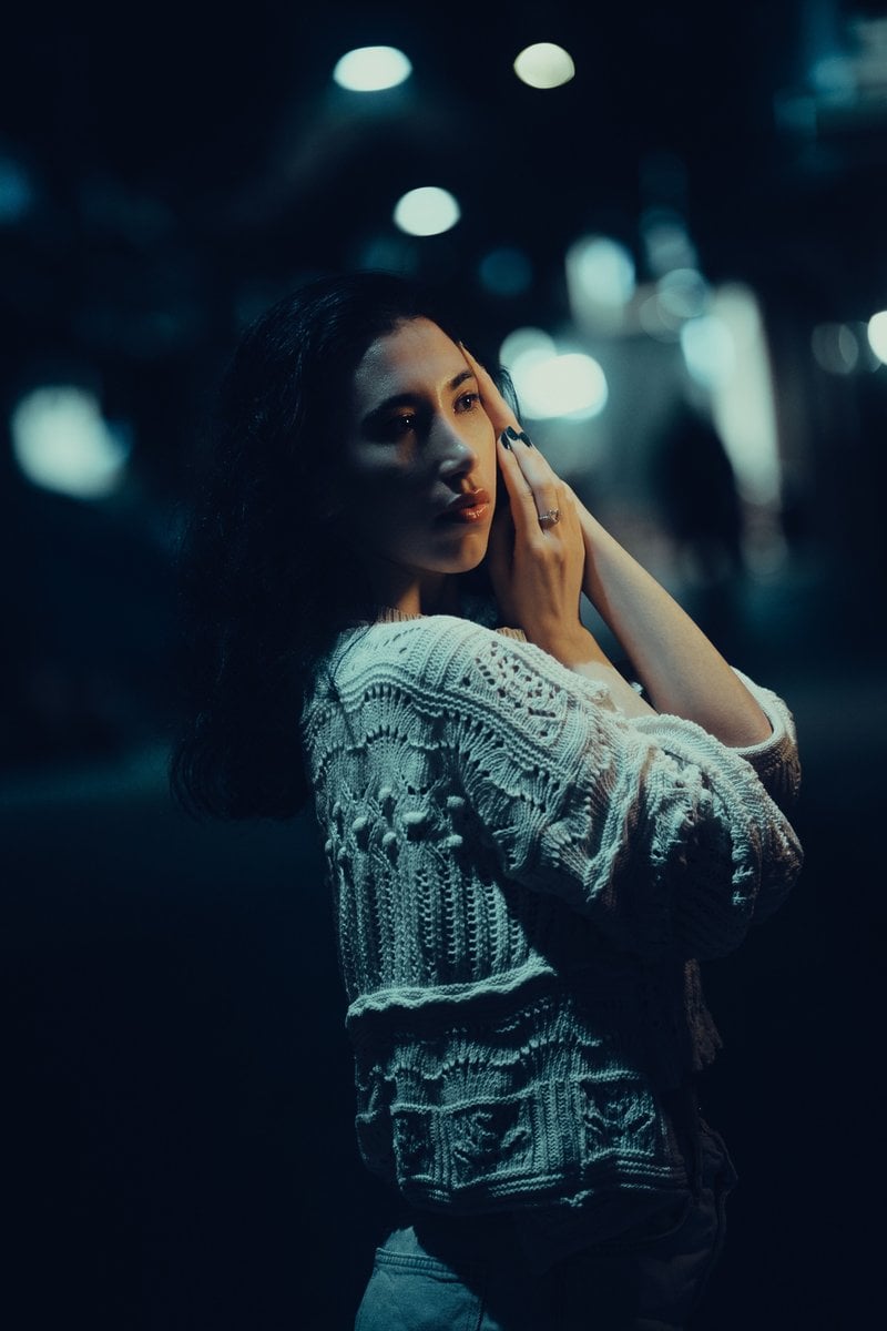 Moody Night Portrait of a Woman in Urban Setting · Free Stock Photo