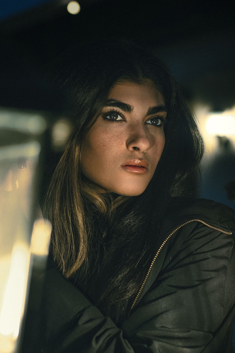Moody Portrait of a Thoughtful Woman at Night · Free Stock Photo