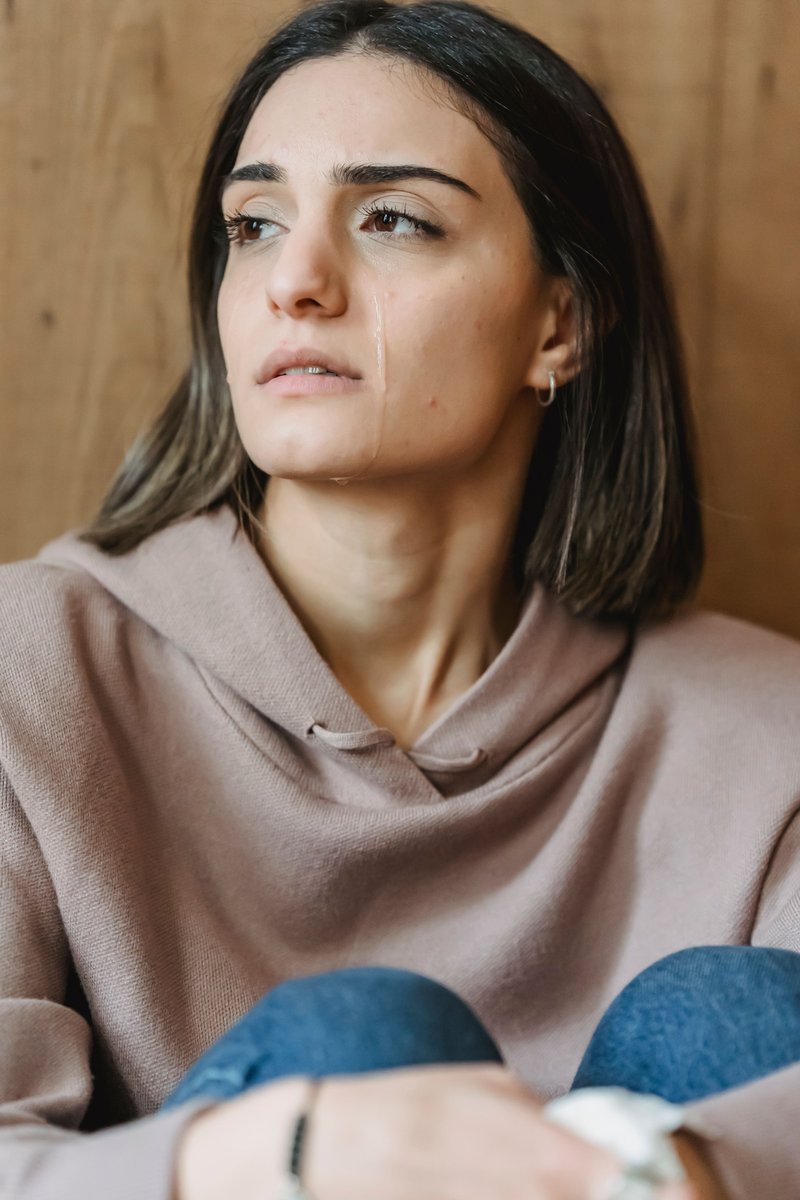Sad woman crying in room · Free Stock Photo Sad woman crying in room · Free Stock Photo