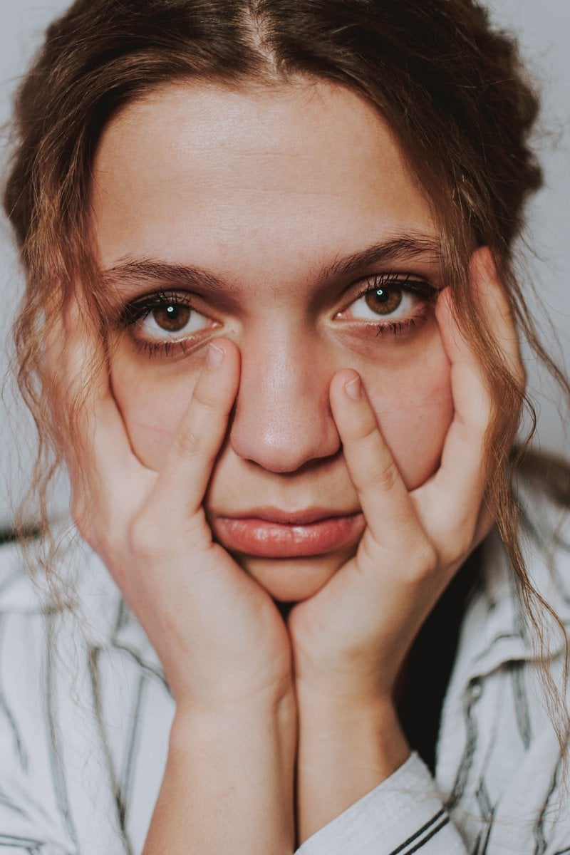 Stressful woman touching face at home &middot; Free Stock Photo