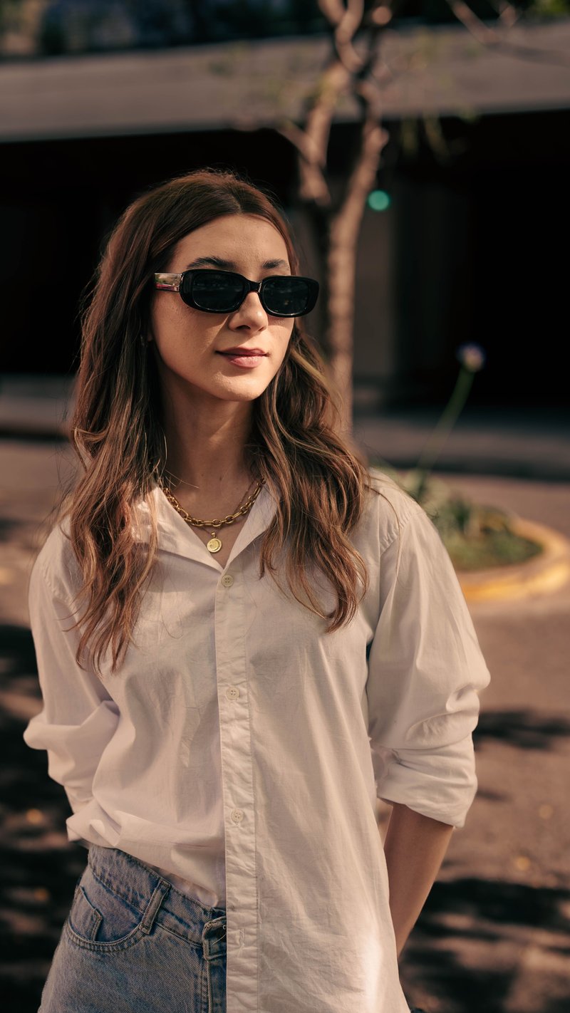 Stylish Woman in Sunglasses on a Sunny Day · Free Stock Photo