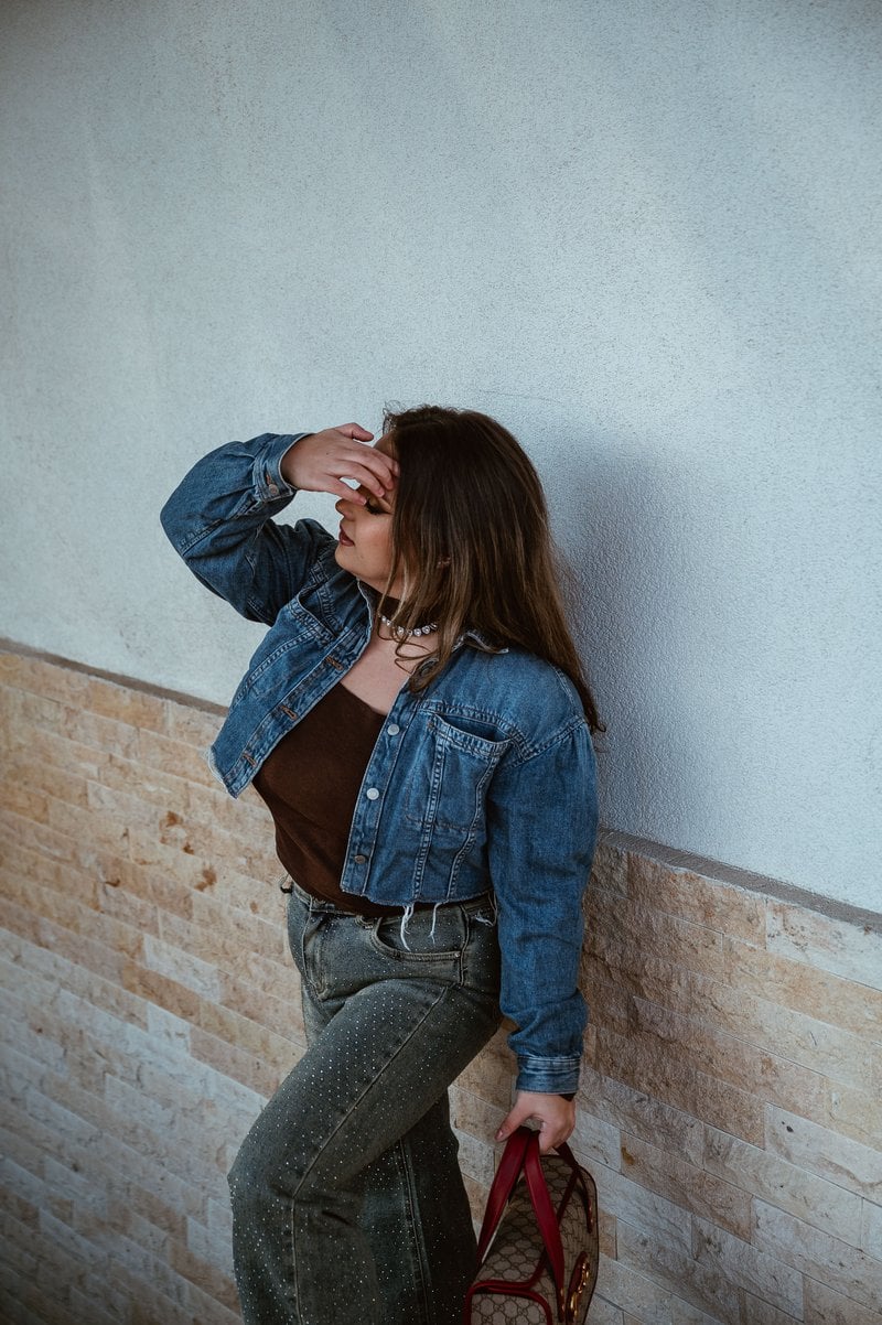 Trendy Woman in Denim Jacket Standing Indoors · Free Stock Photo Trendy Woman in Denim Jacket Standing Indoors · Free Stock Photo