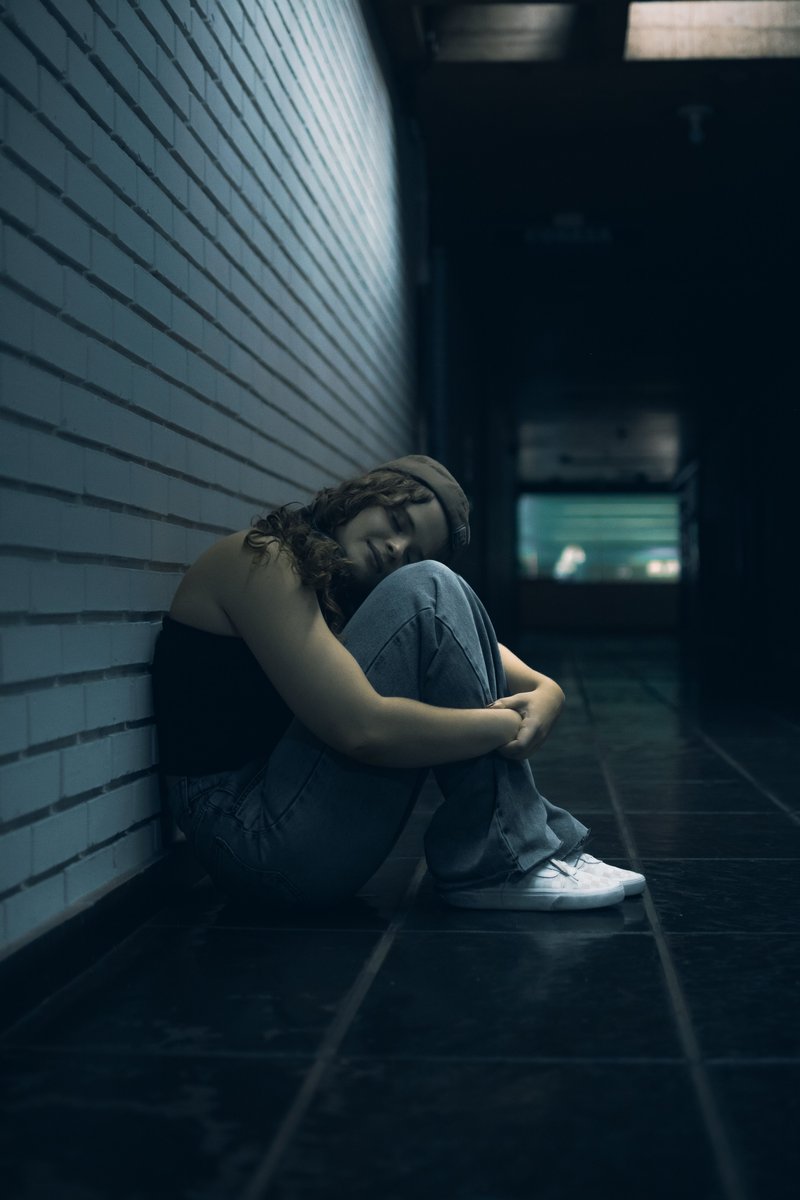 Woman Reflecting Alone in a Dark Hallway · Free Stock Photo Woman Reflecting Alone in a Dark Hallway · Free Stock Photo