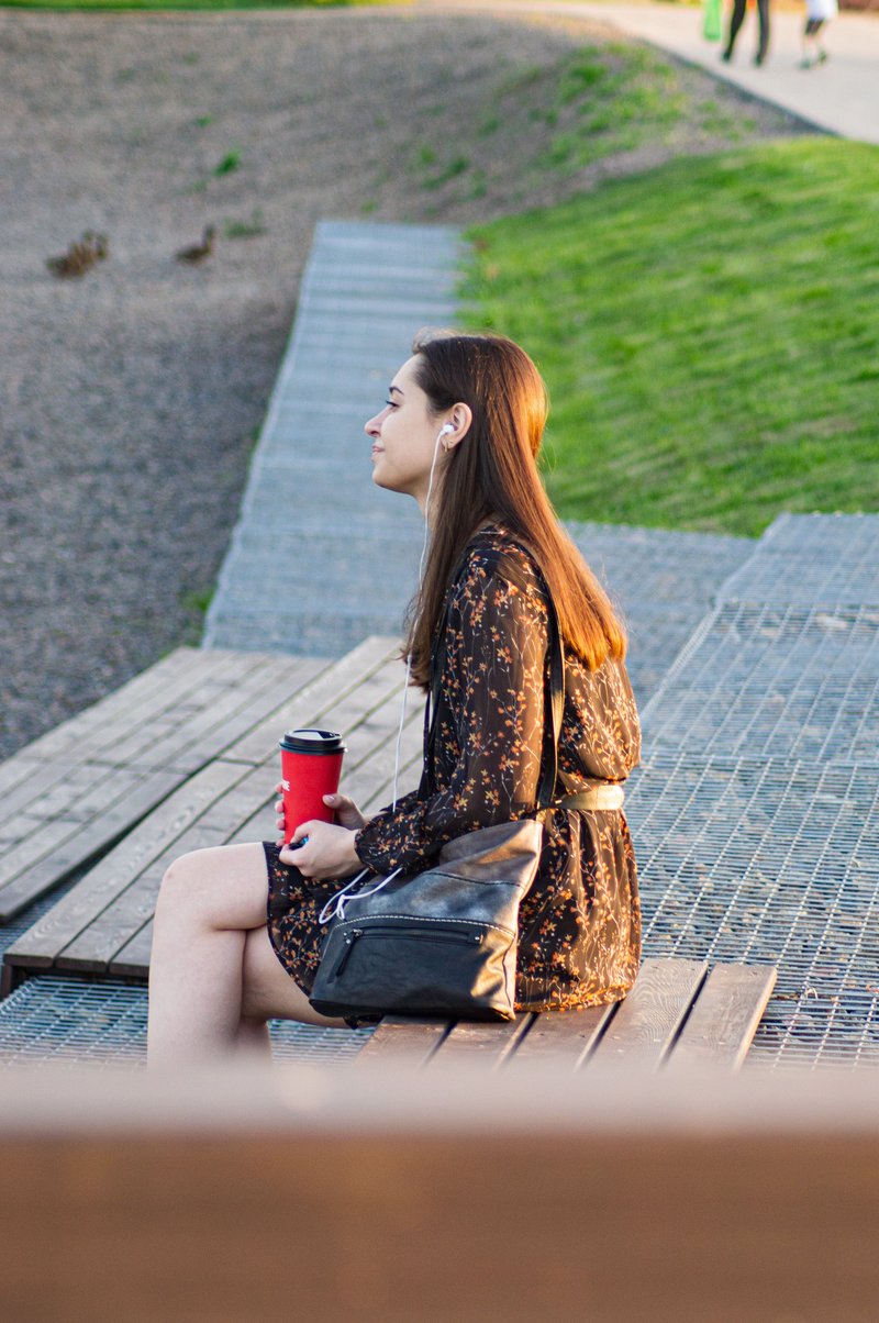 Woman Sitting Alone in a Park · Free Stock Photo Woman Sitting Alone in a Park · Free Stock Photo
