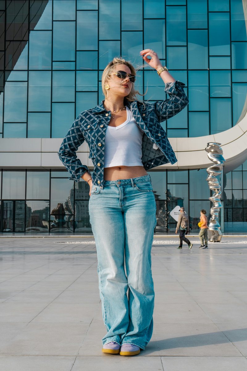 Woman in jeans and jacket posing outside modern building photo &ndash; Free  Aesthetic Image on Unsplash