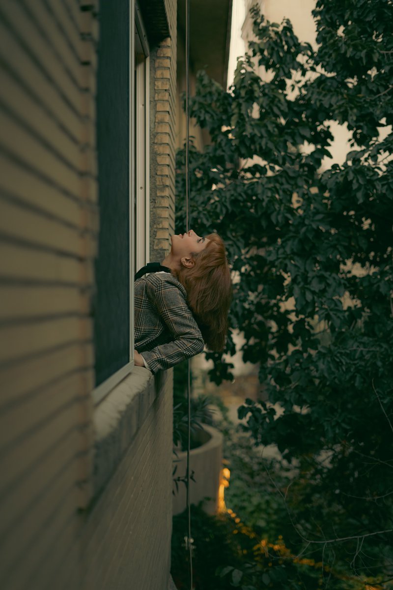 Young Woman Leaning Out the Window of a House · Free Stock Photo Young Woman Leaning Out the Window of a House · Free Stock Photo