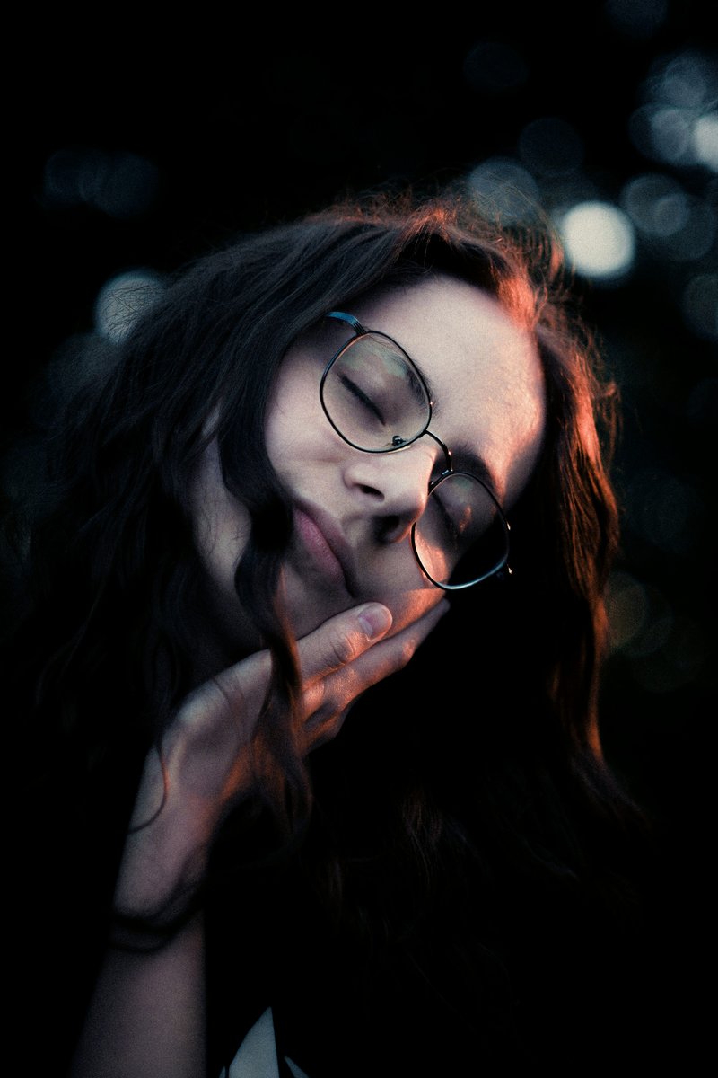 Young woman with glasses resting her head on hand photo &ndash; Free Pink Image  on Unsplash