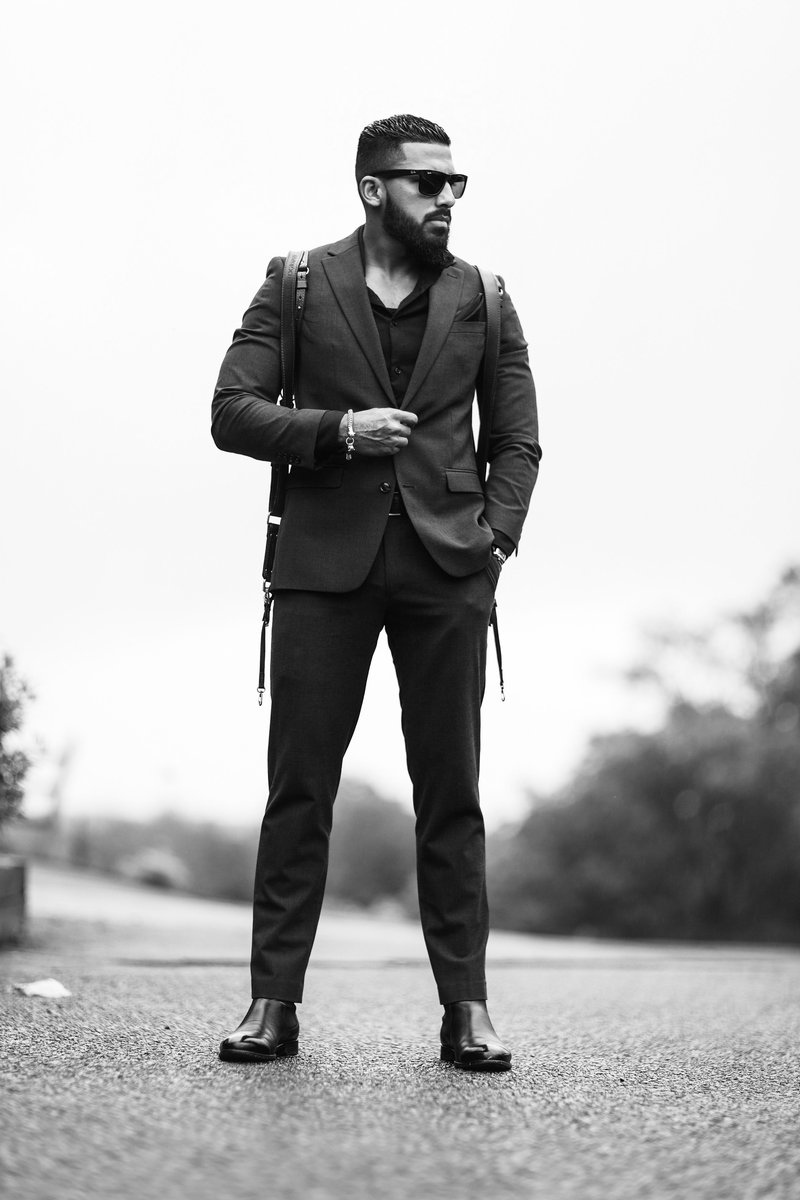 Man Standing in Jacket and Sunglasses · Free Stock Photo Man Standing in Jacket and Sunglasses · Free Stock Photo