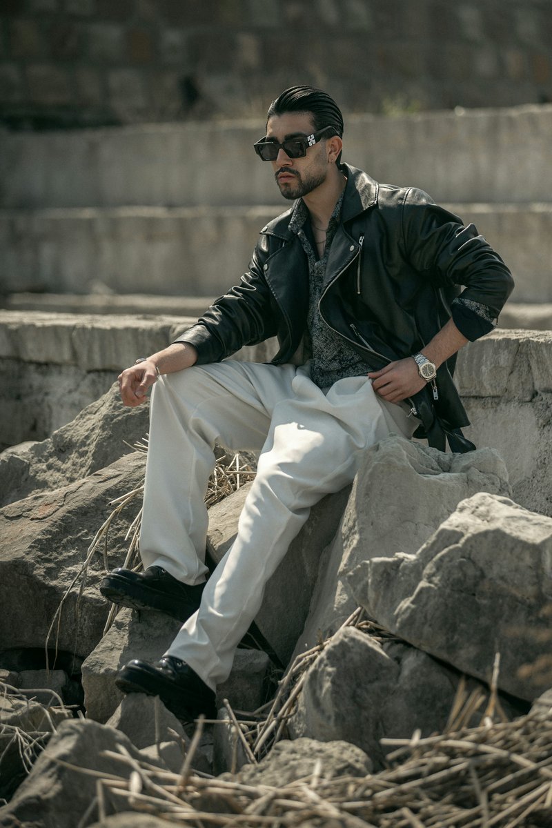Stylish man poses outdoors, wearing sunglasses and leather jacket - Free  Photo on Unsplash