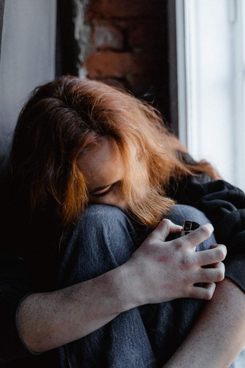 A Lonely Woman Sitting by Herself &middot; Free Stock Photo