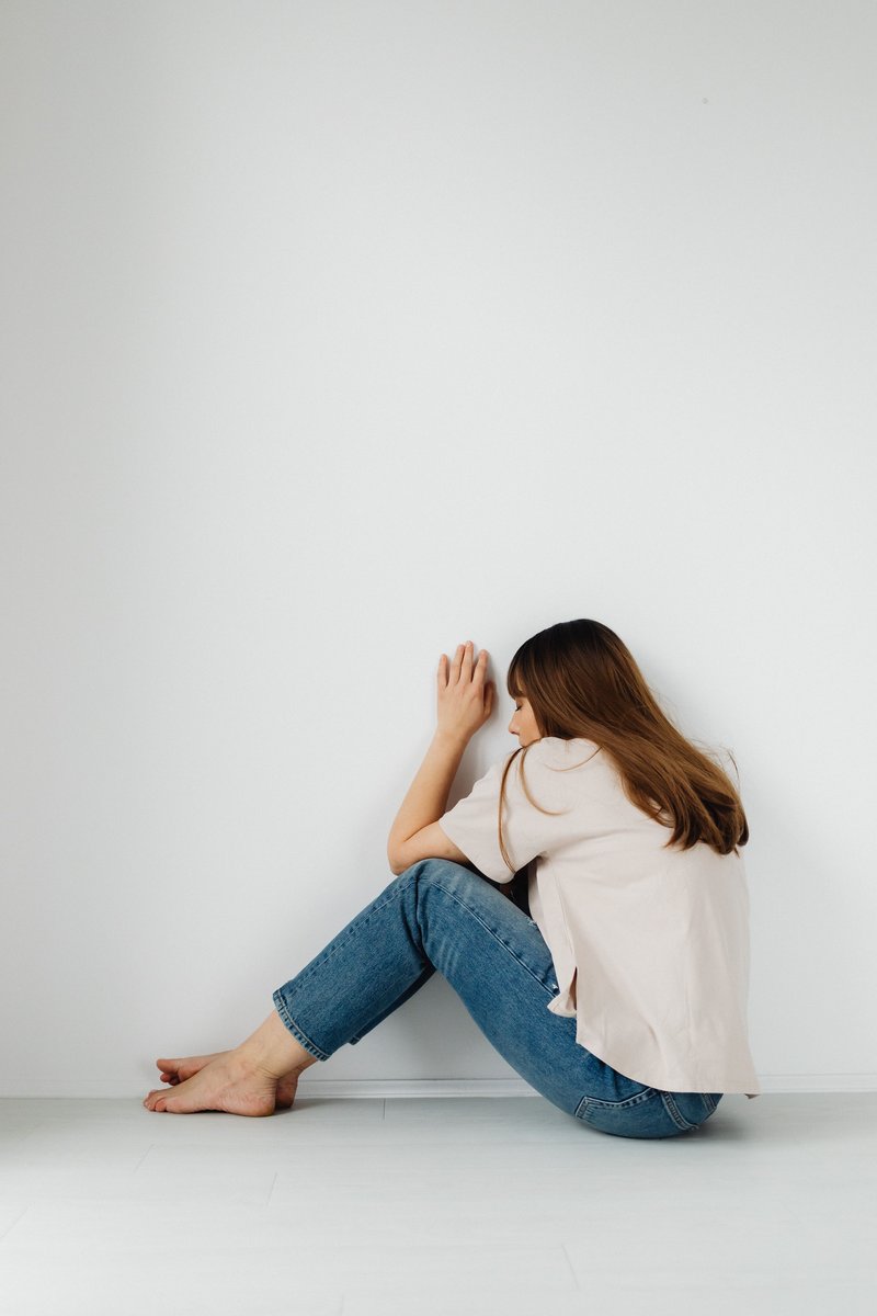 A Lonely Woman Sitting by Herself · Free Stock Photo A Lonely Woman Sitting by Herself · Free Stock Photo