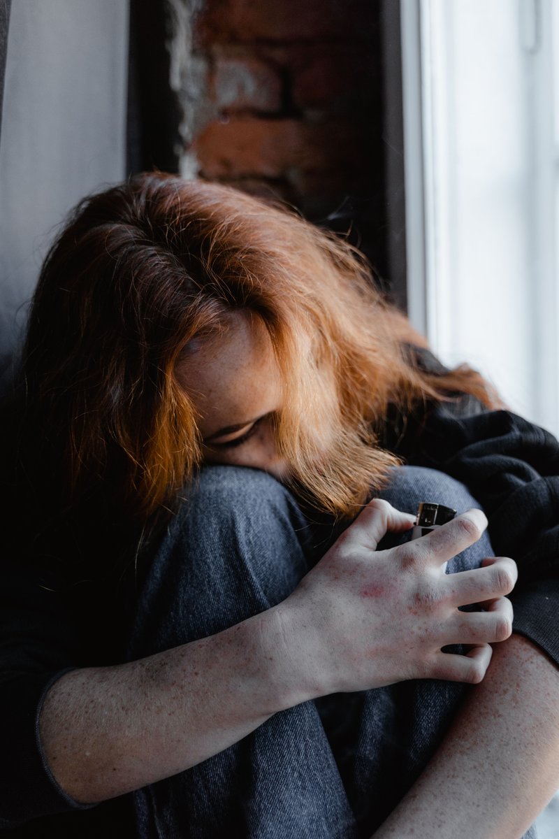 A Lonely Woman Sitting by Herself · Free Stock Photo A Lonely Woman Sitting by Herself · Free Stock Photo