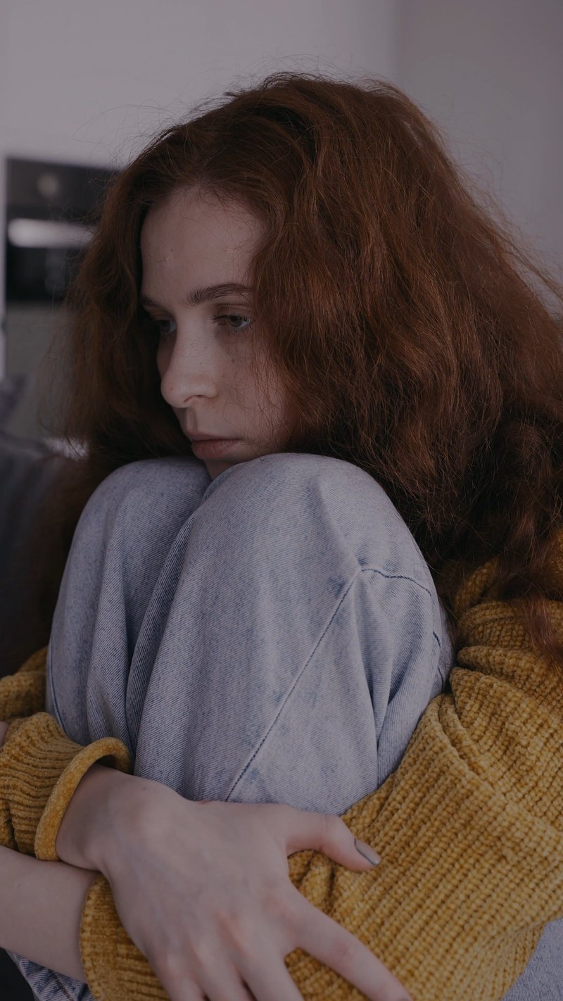 A Sad Woman Hugging her Knees Free Stock Video Footage, Royalty-Free 4K & HD Video Clip