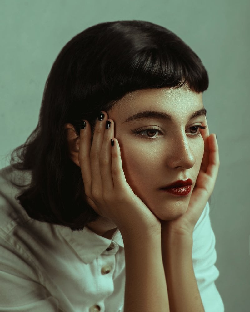 Portrait of Thinking Woman · Free Stock Photo