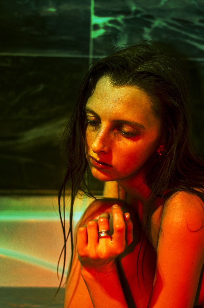 Sad Woman Sitting in a Bathtub · Free Stock Photo
