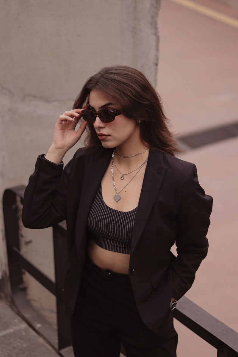 Stylish Woman in Black Blazer Outdoors · Free Stock Photo