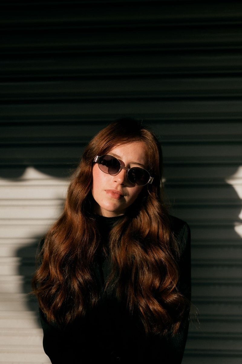 Stylish Woman in Sunglasses with Long Hair · Free Stock Photo