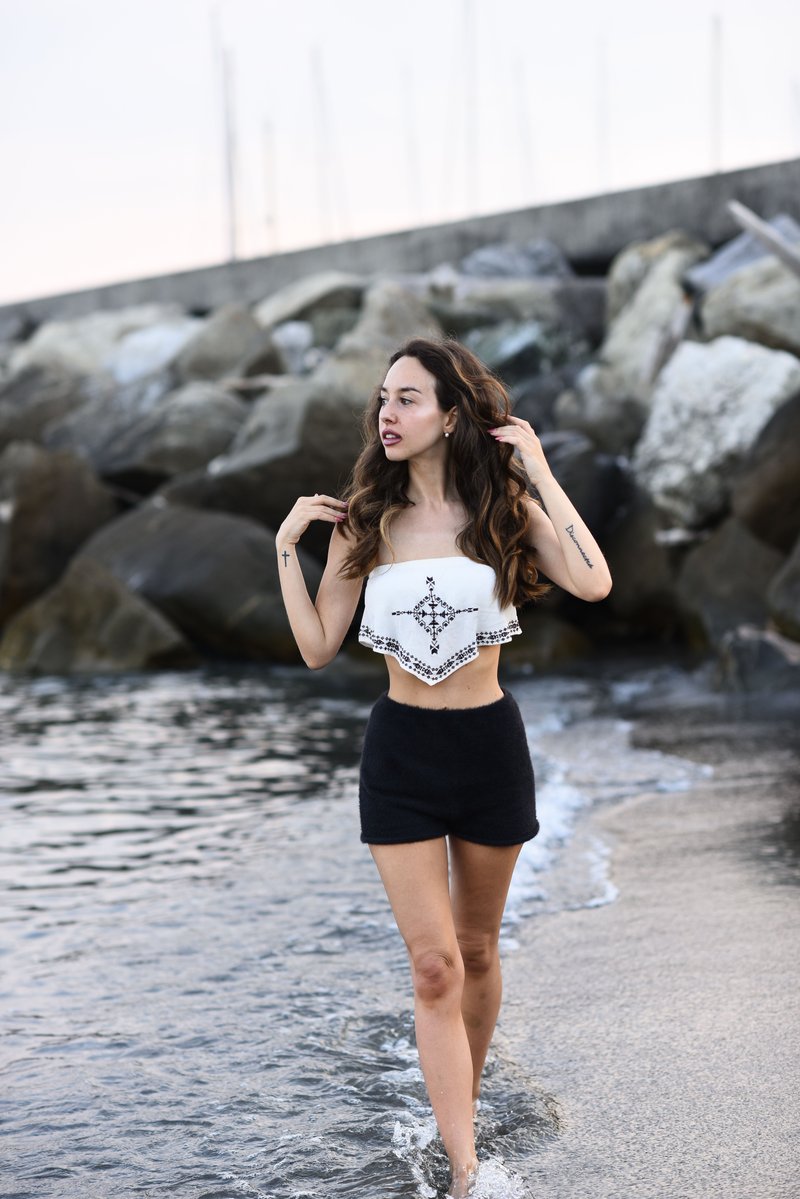 Woman Posing on Sea Shore · Free Stock Photo Woman Posing on Sea Shore · Free Stock Photo